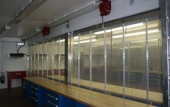 Armory interior with expanded aluminum wall partition